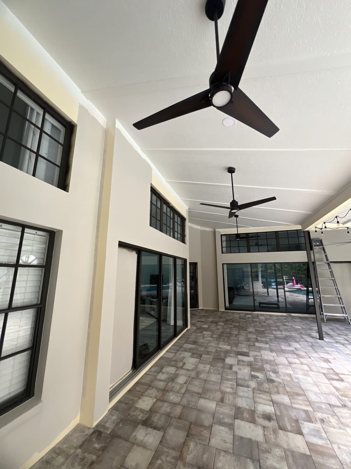 Covered lanai with freshly painted walls and ceiling